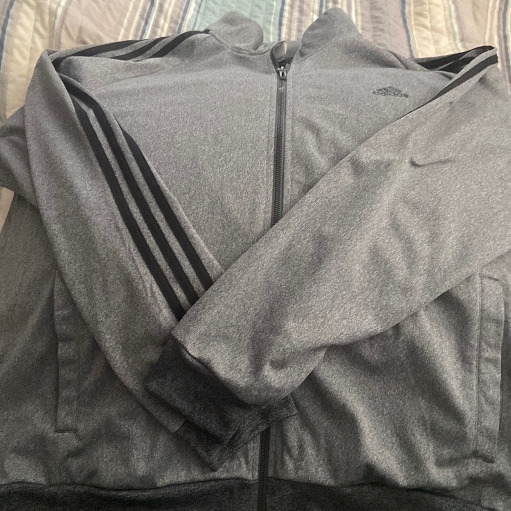 Women’s Gray with black stripes jacket.